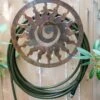 Rustic Sun Wall-Mount Garden Hose Hanger 2 Rustic Sun Wall-Mount Garden Hose Hanger -Backyard Bloomers 8611025 9611 tif